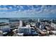 A high angle, aerial view of buildings with ocean view in the distance, under a bright blue sky at 500 N Jefferson Ave # 5, Sarasota, FL 34237