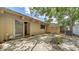Cozy backyard patio area with sliding glass door access at 500 N Jefferson Ave # 5, Sarasota, FL 34237