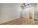 The room boasts high ceilings, wood-look floors, neutral walls, and convenient access to adjacent rooms at 500 N Jefferson Ave # 5, Sarasota, FL 34237