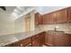 Cozy kitchen with granite countertops and ample cabinet space at 500 N Jefferson Ave # 5, Sarasota, FL 34237