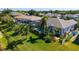 Aerial view of a lush backyard with a pool, patio, and mature trees, creating a private outdoor oasis at 5022 46Th W St, Bradenton, FL 34210