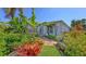 Beautiful garden leading to a charming home with lush landscaping and a peaceful retreat at 5022 46Th W St, Bradenton, FL 34210