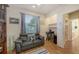 Bright bedroom featuring a comfortable couch, a window, and an integrated desk space at 5022 46Th W St, Bradenton, FL 34210