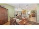Inviting dining room with wooden table, ornate chairs, and decorative chandelier at 5022 46Th W St, Bradenton, FL 34210