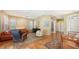 Open living room with an accent rug, large windows, and access to other rooms at 5022 46Th W St, Bradenton, FL 34210