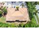 Aerial view of the home displaying its unique roofline and surrounding neighborhood at 5405 46Th W Ct, Bradenton, FL 34210