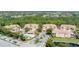 Community aerial view showcasing lush landscaping, ponds, pool area, and well-maintained exteriors at 5405 46Th W Ct, Bradenton, FL 34210