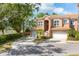 Charming two-story townhome with a two-car garage, set in a beautifully landscaped neighborhood at 5405 46Th W Ct, Bradenton, FL 34210