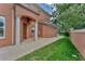 Charming outdoor patio with green lawn and mature trees at 5405 46Th W Ct, Bradenton, FL 34210