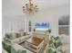 Elegant living room with white walls, chandelier, and stylish furnishings at 5405 46Th W Ct, Bradenton, FL 34210