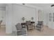 Cozy sitting area boasts three chairs, side tables, and refined decor at 5405 46Th W Ct, Bradenton, FL 34210