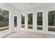 Bright sun room with large windows that showcase a great view to the outside at 5405 46Th W Ct, Bradenton, FL 34210