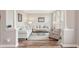 Bright living room with neutral tones, elegant furnishings, and arched windows providing natural light at 5480 White Ibis Dr, North Port, FL 34287