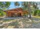 Charming outdoor pavilion with picnic tables, perfect for gatherings and enjoying the community's natural beauty at 5623 Palm Aire Dr, Sarasota, FL 34243