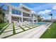 Expansive backyard showcasing a luxurious pool and inviting patio space perfect for outdoor entertaining at 619 Key Royale Dr, Holmes Beach, FL 34217