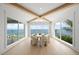 Charming dining room with scenic ocean views and modern decor at 619 Key Royale Dr, Holmes Beach, FL 34217
