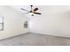Bedroom featuring neutral walls and carpet, a window, and a ceiling fan at 620 49Th E St, Bradenton, FL 34208