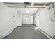 Spacious basement with concrete floor, white walls, and ample lighting at 7158 S Leewynn Dr, Sarasota, FL 34240