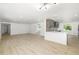 Spacious open-concept kitchen featuring modern appliances and a breakfast bar for casual dining at 7158 S Leewynn Dr, Sarasota, FL 34240