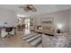 Bright living space with neutral walls open to a dining area at 721 N Jefferson Ave # 721, Sarasota, FL 34237