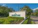 Entrance sign to University Park, surrounded by lush greenery and manicured landscaping at 7319 Westminster Ct, University Park, FL 34201