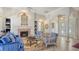 Bright and airy living room with a fireplace, archways, and elegant decor at 7319 Westminster Ct, University Park, FL 34201