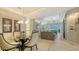 Open-concept living space with dining area, living room, and kitchen providing seamless flow at 8263 Nice Way, Sarasota, FL 34238