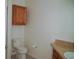 Bathroom featuring a toilet and sink at 8325 38Th Street E Cir # 101, Sarasota, FL 34243