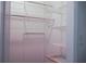 Walk-in closet features extensive white wire shelving at 8325 38Th Street E Cir # 101, Sarasota, FL 34243