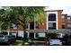 Exterior view of three story condo buildings with covered parking at 8325 38Th Street E Cir # 101, Sarasota, FL 34243