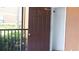 Outdoor door leads to screened in porch at 8325 38Th Street E Cir # 101, Sarasota, FL 34243