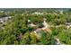 Home with a screened pool is nestled among mature trees in a serene setting at 9207 59Th Avenue E Dr, Bradenton, FL 34202