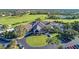 Aerial view of the community clubhouse with beautifully landscaped roundabout at 9630 Club South Cir # 6204, Sarasota, FL 34238