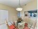 Dining area looking to the kitchen with pass through window at 9630 Club South Cir # 6204, Sarasota, FL 34238