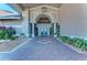 The entrance to Stoneybrook is flanked by mature landscaping and planters at 9630 Club South Cir # 6204, Sarasota, FL 34238