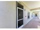 Private front door entrance to unit on a walkway at 9630 Club South Cir # 6204, Sarasota, FL 34238