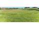 Golf course putting green with well manicured grass at 9630 Club South Cir # 6204, Sarasota, FL 34238