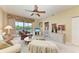 Comfortable living room with access to a screened in patio at 9630 Club South Cir # 6204, Sarasota, FL 34238