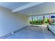 Assigned covered parking area with mature landscaping at 9630 Club South Cir # 6204, Sarasota, FL 34238