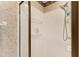 Bright shower featuring white tile and a glass door at 9630 Club South Cir # 6204, Sarasota, FL 34238