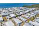 Aerial view of waterfront community with access to open water at 10315 Cortez W Rd # 24H, Bradenton, FL 34210
