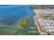 An aerial view of waterfront community and marina by the water at 10315 Cortez W Rd # 24H, Bradenton, FL 34210