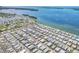 Overhead shot of a vibrant community nestled along the coast, featuring serene waterfront views at 10315 Cortez W Rd # 24H, Bradenton, FL 34210