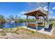 Relax in a covered gazebo with lake views and enjoy nature near the community at 10315 Cortez W Rd # 24H, Bradenton, FL 34210