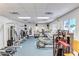 The well-equipped gym has modern equipment and mirrors, offering residents a convenient fitness space at 10315 Cortez W Rd # 24H, Bradenton, FL 34210