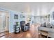 Inviting living room with hard floors, comfortable furniture, and a bright atmosphere at 10315 Cortez W Rd # 24H, Bradenton, FL 34210