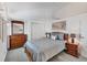Serene main bedroom with matching furniture, soft carpeting, and calming decor at 10315 Cortez W Rd # 24H, Bradenton, FL 34210