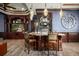 Basement wet bar with decorative lighting and a TV at 12224 Garden Lake Cir, Odessa, FL 33556
