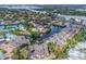 Gorgeous aerial view showcasing waterfront homes and boat docks along a scenic canal and lush landscaping at 1235 Dockside Place # 108, Sarasota, FL 34242