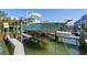 Picture of modern boat lift and vessel ready for water access at 1235 Dockside Place # 108, Sarasota, FL 34242